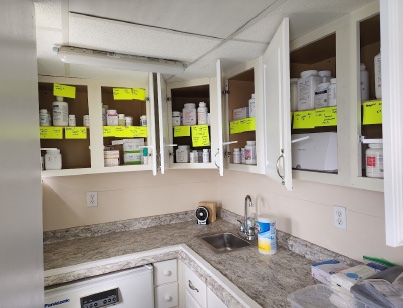 Medication storage cabinets aboard Mercy, stocked and labelled.